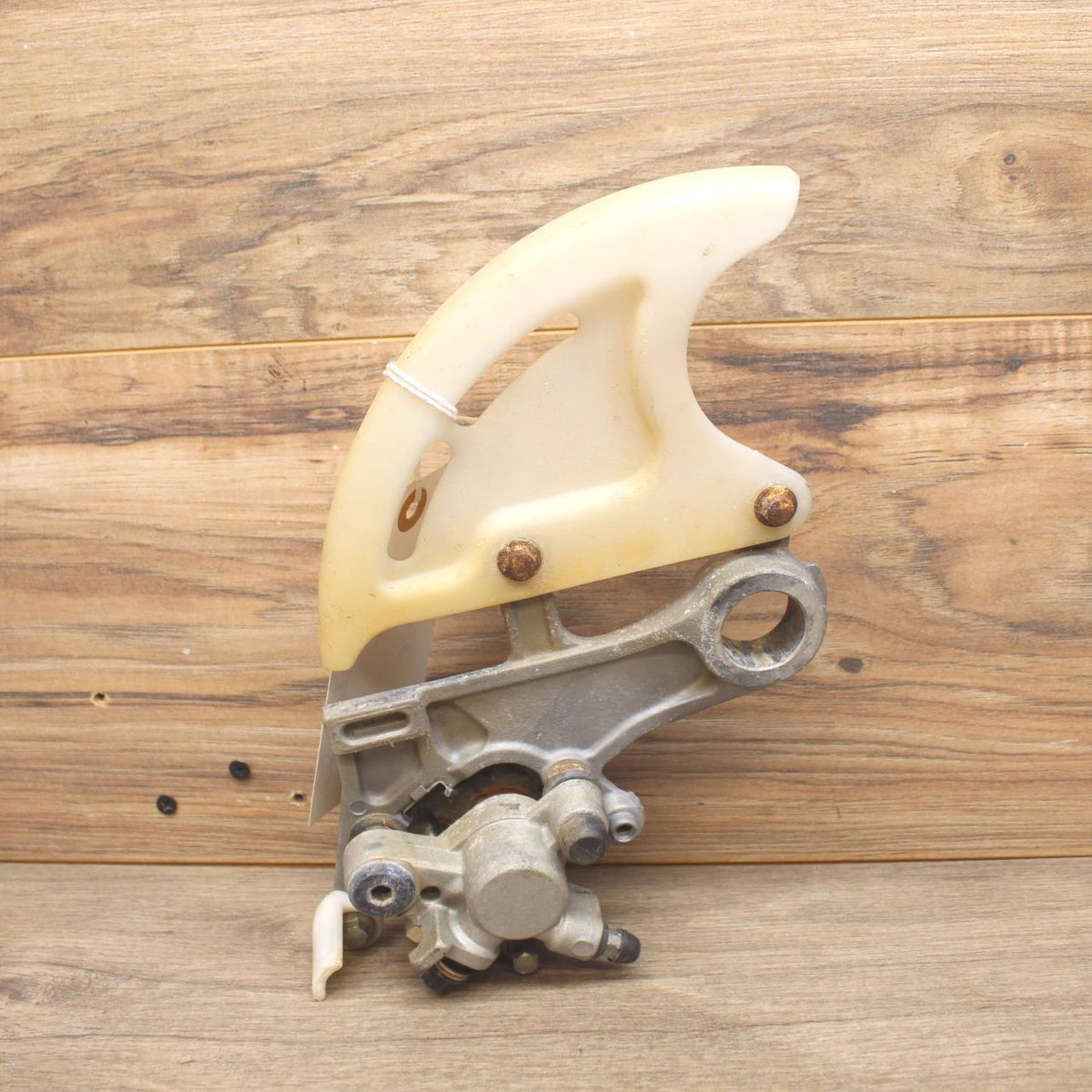 2005 Honda CRF250R REAR BACK BRAKE CALIPER W HANGER